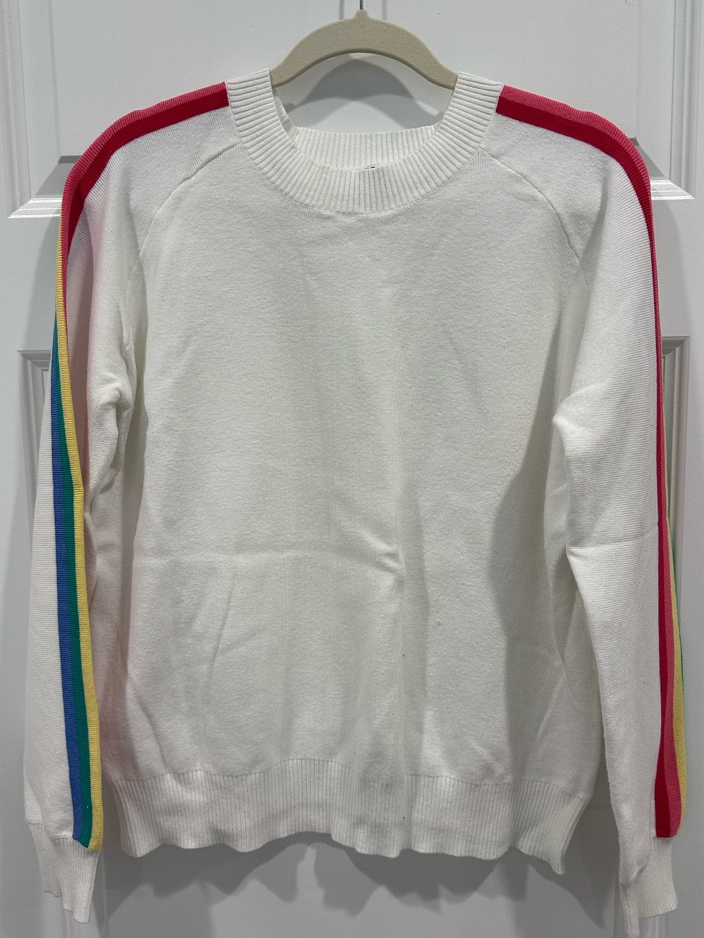 Women’s sweater with multiple
Colors down shoulder and sleeve